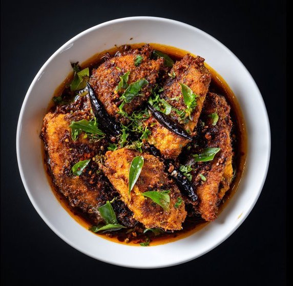 Crispy Fish Manchurian tossed in a spicy Indo-Chinese sauce with garlic, ginger, and bell peppers at House of Biryanis and Kebabs in Iselin, NJ
